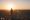 Girl on the beach, in front of the Ocean, at Sunset, San Francisco