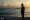 Girl in front of the Ocean, at Sunrise, Miami Beach