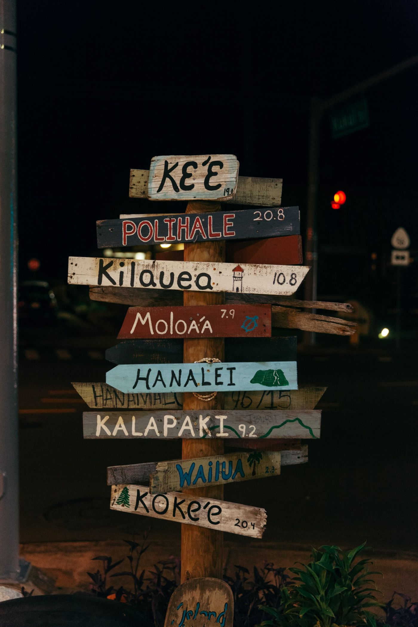 Sign with destinations and distances, Kapaa, Kauai, Hawaii