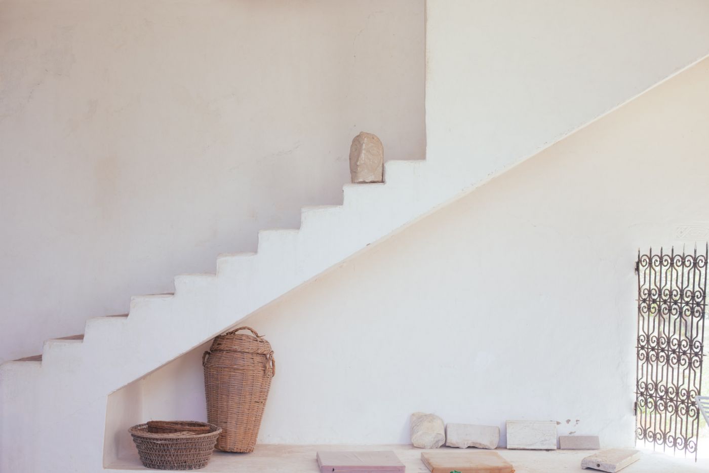 Architectural white stairs, iron fence, Tunisia