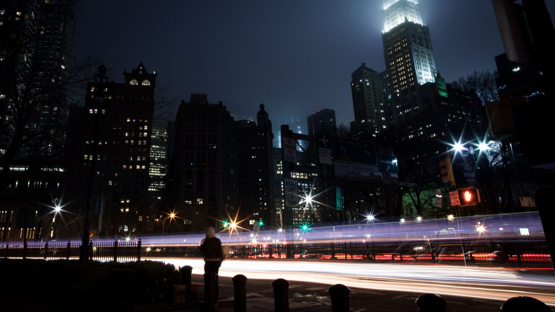 Long exposure of girl, night, New York City