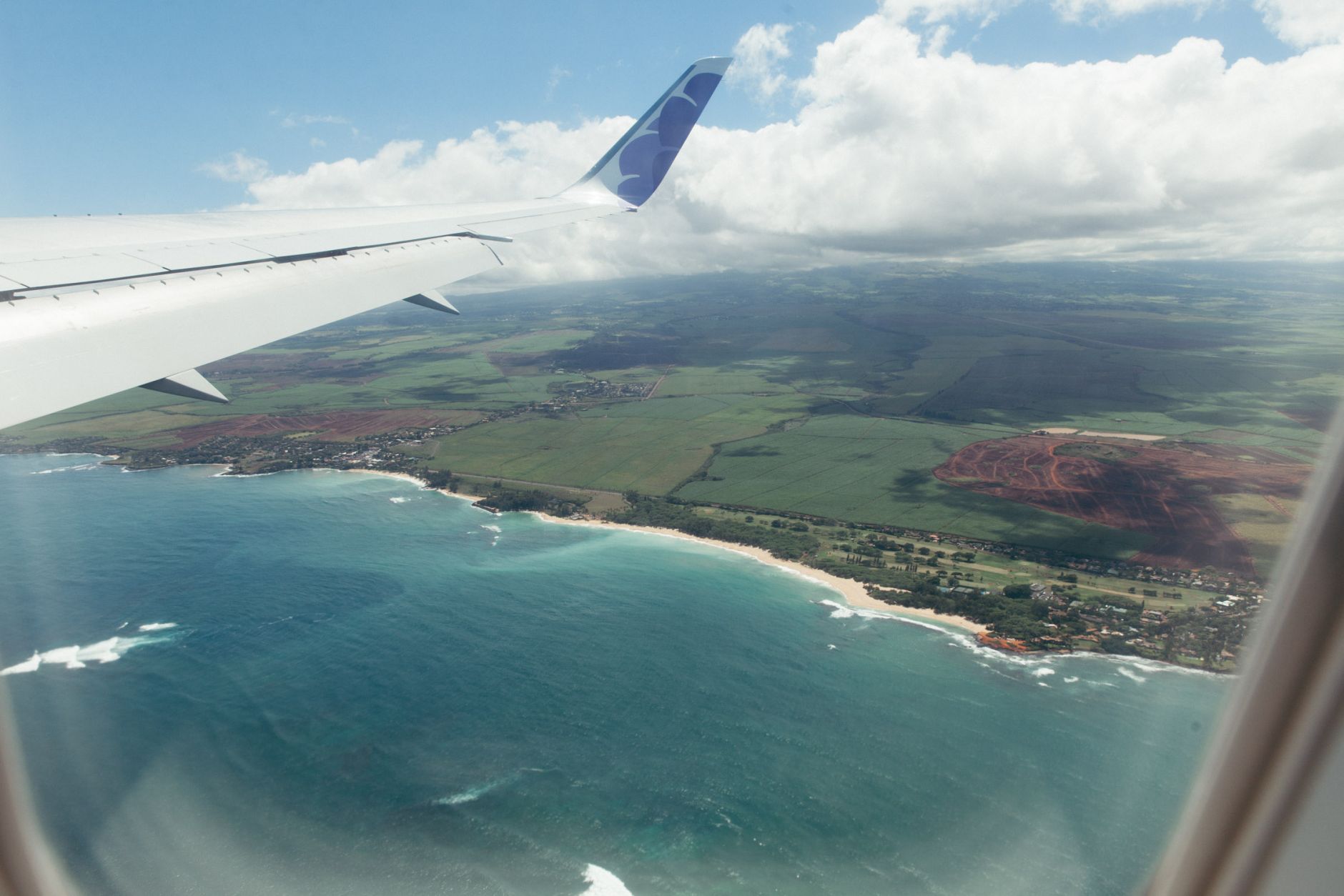 View of Mau'i and the Pacific Ocean from the plane